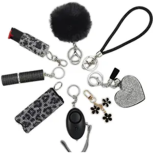 Gift Keychain Set for Women Including Wrist Strap, Heart Accessory, Petal Decor and Pom Pom