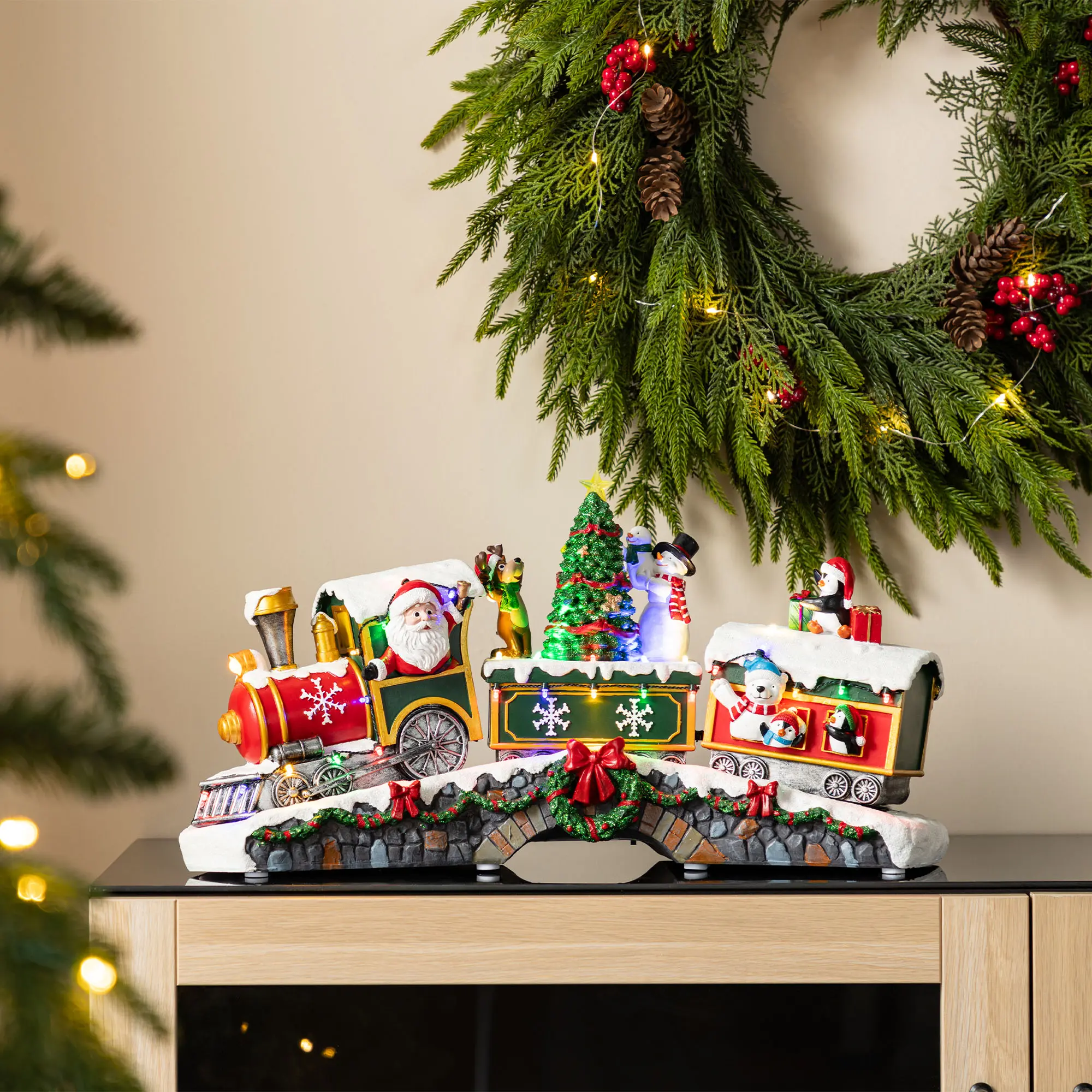 Glitzhome 20"L Lighted Christmas Santa Train Musical Resin Village with Movement and Timer