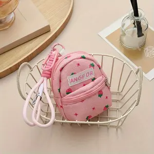 1pc of a Pink Mini Backpack Pendant Purse Featuring a Strawberry Print, Equipped with an Adjustable Keychain.This Multifunctional And Portable Coin Wallet Also Serves As an Earphone Pouch for Teenager.It'S a Durable Compact Crossbody Bag Suitable