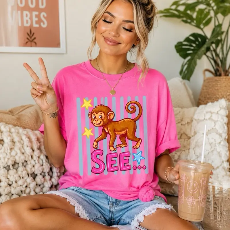 Women's Casual Cute Shortsleeve Graphic Tee - Orchid Comfort Colors, Monkey See Monkey Do Print, Denim-Accent Tops with Flattering Fit