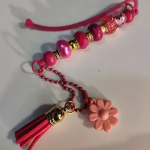 Pink Beaded Bookmarker with Pink Beads, Flower Charm, and Tassels