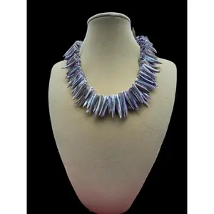 Purple Spikes Necklace with Decorative Spikes on Light-Colored Background