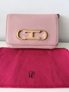 Pre-owned Leather Clutches & Wristlets Carolina Herrera CH Pink Clutch / Crossbody Bag with Gold Logo Hardware