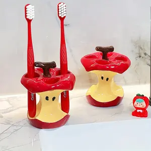 Original Design Fun Apple Core Ceramic Toothbrush Holder - Red and Yellow Bathroom Decor, Stand-alone Non-Radio Surface Organizer, Durable Ceramic Holiday Gift, Home Decor, Bathroom Toothbrush Holder, Playful Accent, Gloss Finish, Innovative Accent