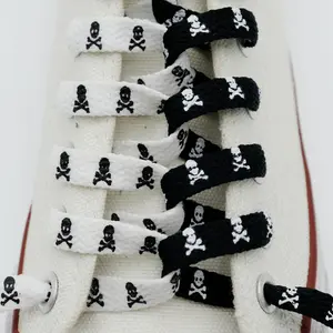 patterned shoe laces eli Two pairs of printed shoe laces with skull patterns