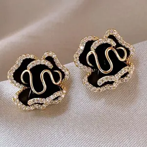 Luxury designer earrings for women to wear to parties