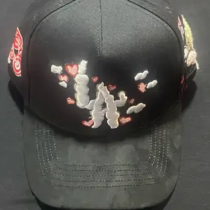 Black Embroidered Cap with Heart and Cloud Designs for Stylish Outfits