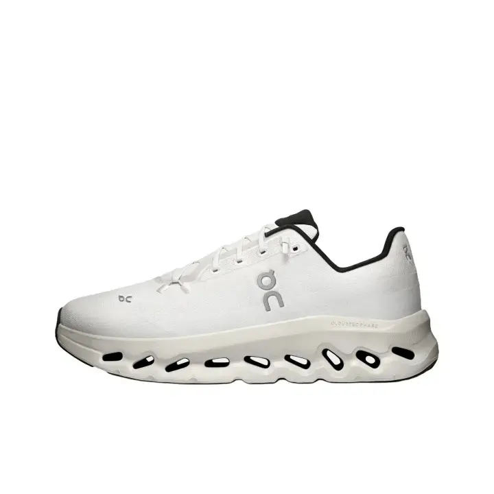 Clean White Knit Athletic Running Shoes, Unique Hollow Cloud Cushion Structure, Lightweight Responsive Foam Midsole, Minimalist Black Accent, All-Day Comfort Road Trainers