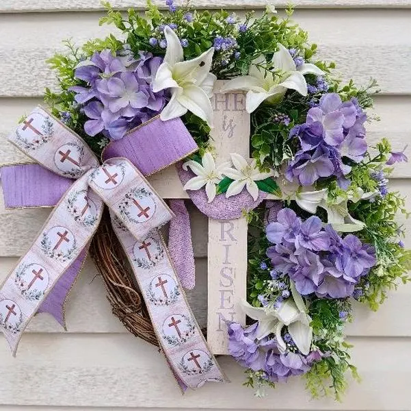 He is Risen Grapevine Wreath with Purple and White Flowers and Cross Bow for Easter Decor