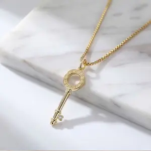 Spring/Summer Chic  Key Pendant Necklace | Gold Tone Minimalist Chain with CZ Detail  Perfect for Daily Wear, Layering & Gift Giving jewelry cross choker necklace