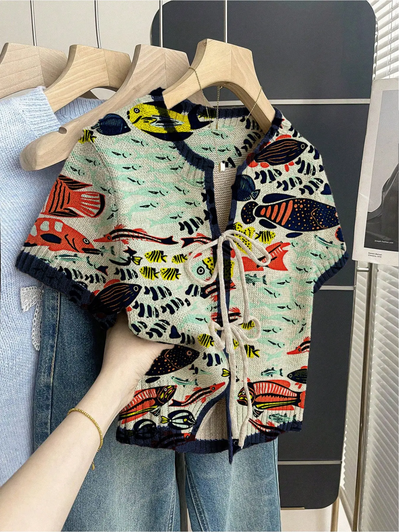 Women's khaki bohemian style vacation ethnic short-sleeve knit top. Loose round neck, contrast patchwork fish print, front tie design, contrast piping. Comfortable for spring & summer casual wear. Casual Classy Top Womenswear Lady