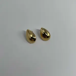 Alien dome gold earrings
