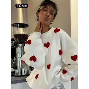 Women’s loose-fit heart-pattern drop-shoulder sweater, casual long-sleeve round-neck knit top for spring and fall, fashionable ladies’ knitwear for everyday wear