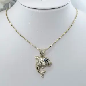(115) Elegant Dolphin Pendant Necklace with Sparkling Rhinestones and Gold-Tone Chain for Women
