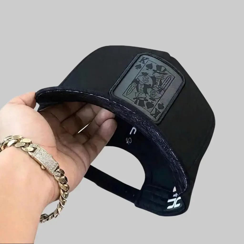 Urban Streetwear Trucker Cap - Black Adjustable Hat with Graphic Patch