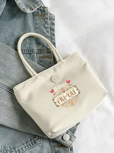 Minimalist Cream Handbag with Decorative Emblem - Structured Rectangular Design, Short Rounded Handles, and Button Closure - Chic Purse for Daily Use, Shopping, and Elegant Outings