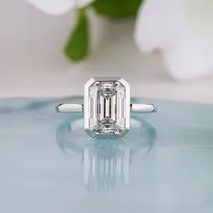 Bezel Set Emerald Cut Moissanite Engagement Ring