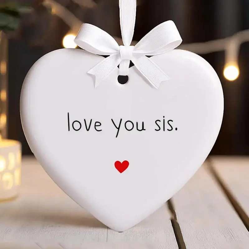 1pc Sister Christmas Ceramic Ornament, I Love You Keepsake, Family Ceramic Ornament 2025, Sweet Ceramic Ornament Gift For Sister, Home Decor Ornament, Cute Ornament, Festive Decoration, Decorative Ornament, Holiday Ornament