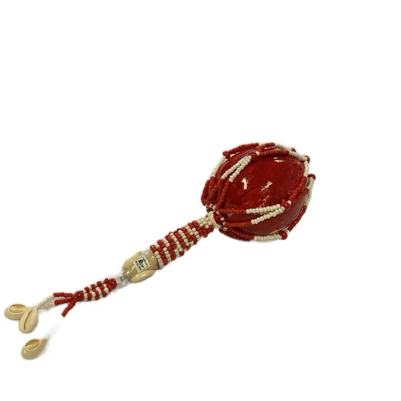 Shango orisha maraca decorated with red and white beads Shango orisha maraca decorated with red and white beads