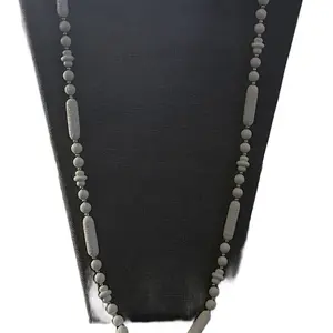 Sarah Cov Vintage White Beaded Necklace Classic White Beads on a Necklace Displayed on a Black Fabric Background Plastic Material