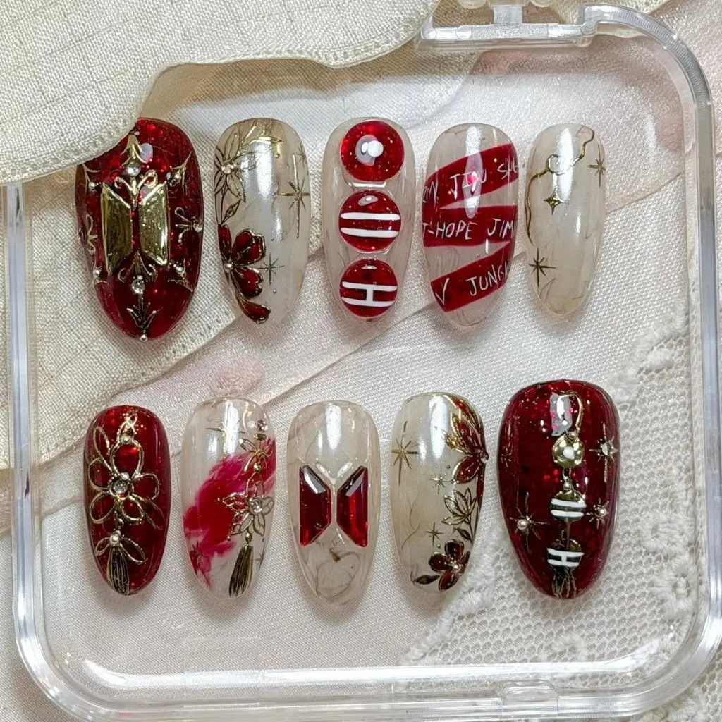 ARIRANG Inspired Christmas Press On Nails | Red Gold Holiday Kpop Nails with Logo, Ornaments & Hand Painted Details
