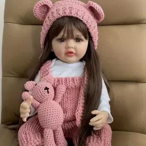 22" Realistic Princess Doll with Long Brown Hair & Pink Bodysuit - Silicone Baby Doll with Teddy Bear Stuffed Animal & Accessories - Sitting & Standing - Perfect Christmas Gift or Birthday Present for Collectors