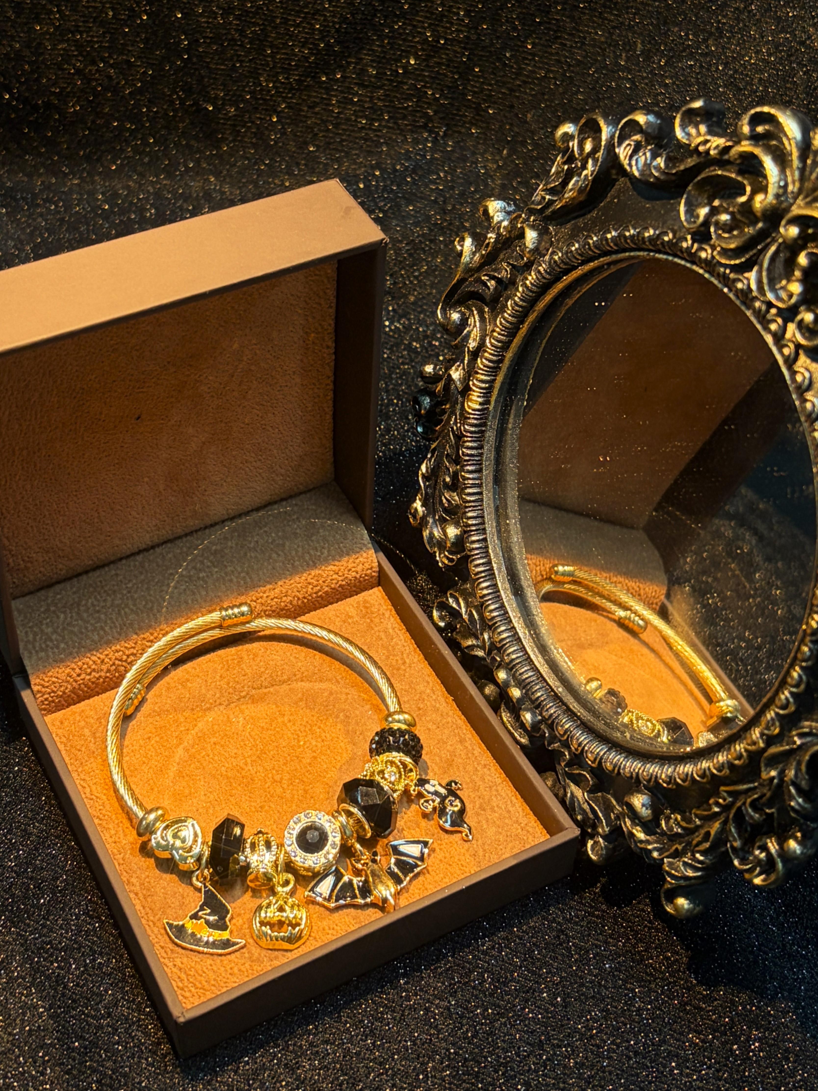 Women's Gold-Tone Open Cable Charm Bangle with Black Crystal Beads, Halloween Witch Hat Pumpkin Bat Ghost Charms, Stackable Costume Jewelry Bracelet