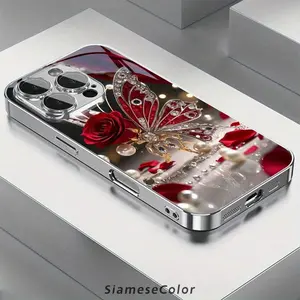 An elegant phone case with a butterfly design, featuring luxurious red rose jewelry, suitable for iPhone 16 Pro Max, 15, 14 Plus, 13, 12, and 11. Lightweight, non-slip, suitable for everyone