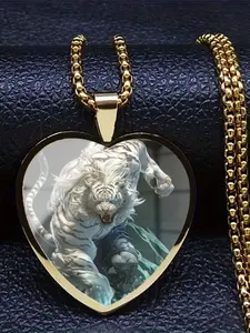 A transparent glass heart necklace adorned with delicate 2D patterns.