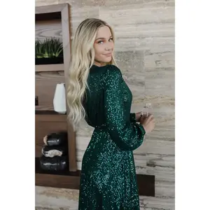 THE SPARKLY SEQUIN WRAP DRESS IN HUNTER GREEN BY SARAH TRIPP X PINK DESERT