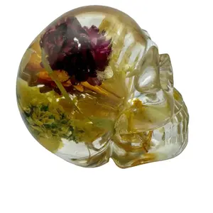 Flowers in the attic ~ one of an kind epoxy resin skull. Harvest flowers captured in clear epoxy resin.