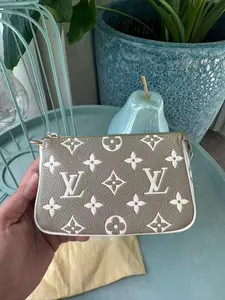Pre-owned Louis Vuitton leather Mini Bags Mini Pochette Accessoires