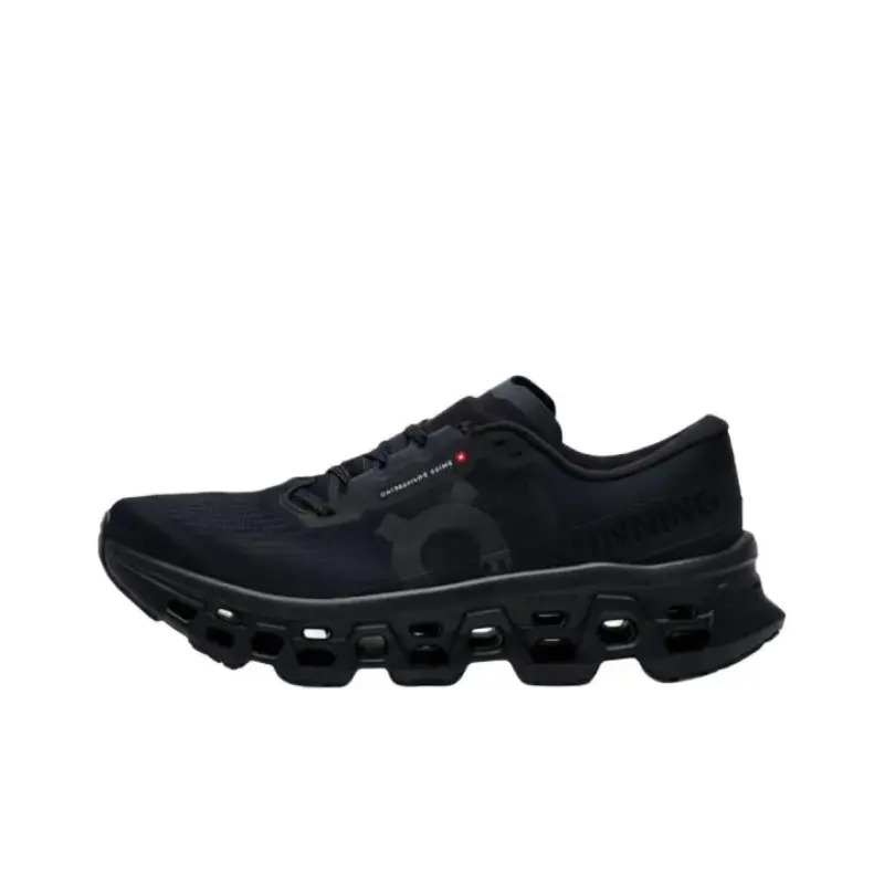 Jet black breathable perforated mesh unisex running sneakers, hollow sculpted full black foam midsole, tiny red side tag accents, fit for city jogging mall strolls daily office commutes