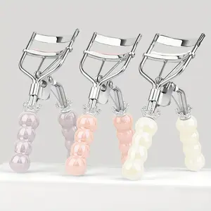 1 high-end craftsmanship crown ceramic handle eyelash curler, smooth and transparent pearl ceramic handle design, three styles of eyelash curlers in pink, beige and purple, long-lasting curling eyelash curler shape, portable eyelash curler