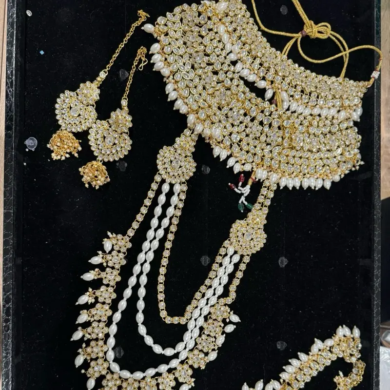 Elegant Wedding Bridal Set with Intricate Gold and Pearl Accents for Special Occasions