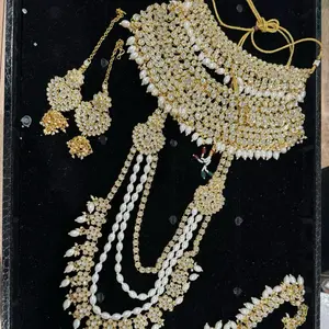 Elegant Wedding Bridal Set with Intricate Gold and Pearl Accents for Special Occasions