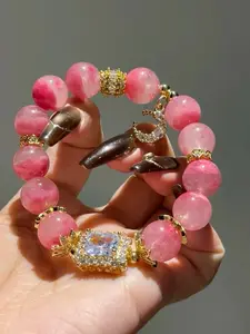 natural ice rhodonite+golden accessory