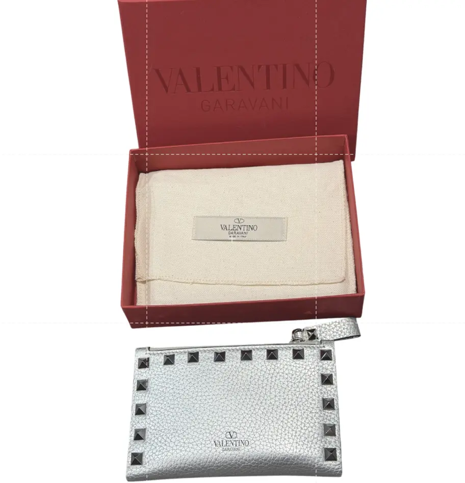 Pre-owned Valentino Leather Small leather goods Garavani Rockstud Compact Zipper Card Holder Final Sale, 0.8 In Grained Metallic Calfskin Leather, Signature Palladium Finish Pyramid Studs, Includes Box & Dust Bag