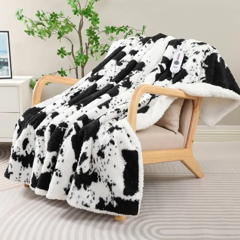Timi Calda Black & White Cow Print Heating Fleece Blanket - 4 Heating Levels, 4-Hour Auto Shut Off #cowprint #heating