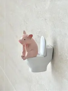 1pc Adorable Pig Figurine Perched on a Toilet - a PVC Decoration for Your Bathroom, Suitable for Desktop Or Wall Display, Perfect for Home Office Desks And Living Room Decor, As Well As Bathroom Additions And Decorative Statues