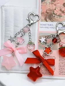 Fashionable and cute strawberry five pointed star keychain pendant, suitable for daily wear, vacation and dating occasions, and also a surprising and exquisite small gift.