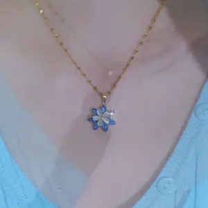 Blue Snowflake Spinning Pendant Necklace for Women, Chic Minimalist Design, Elegant Winter-Inspired Fashion Jewelry DZXL3796