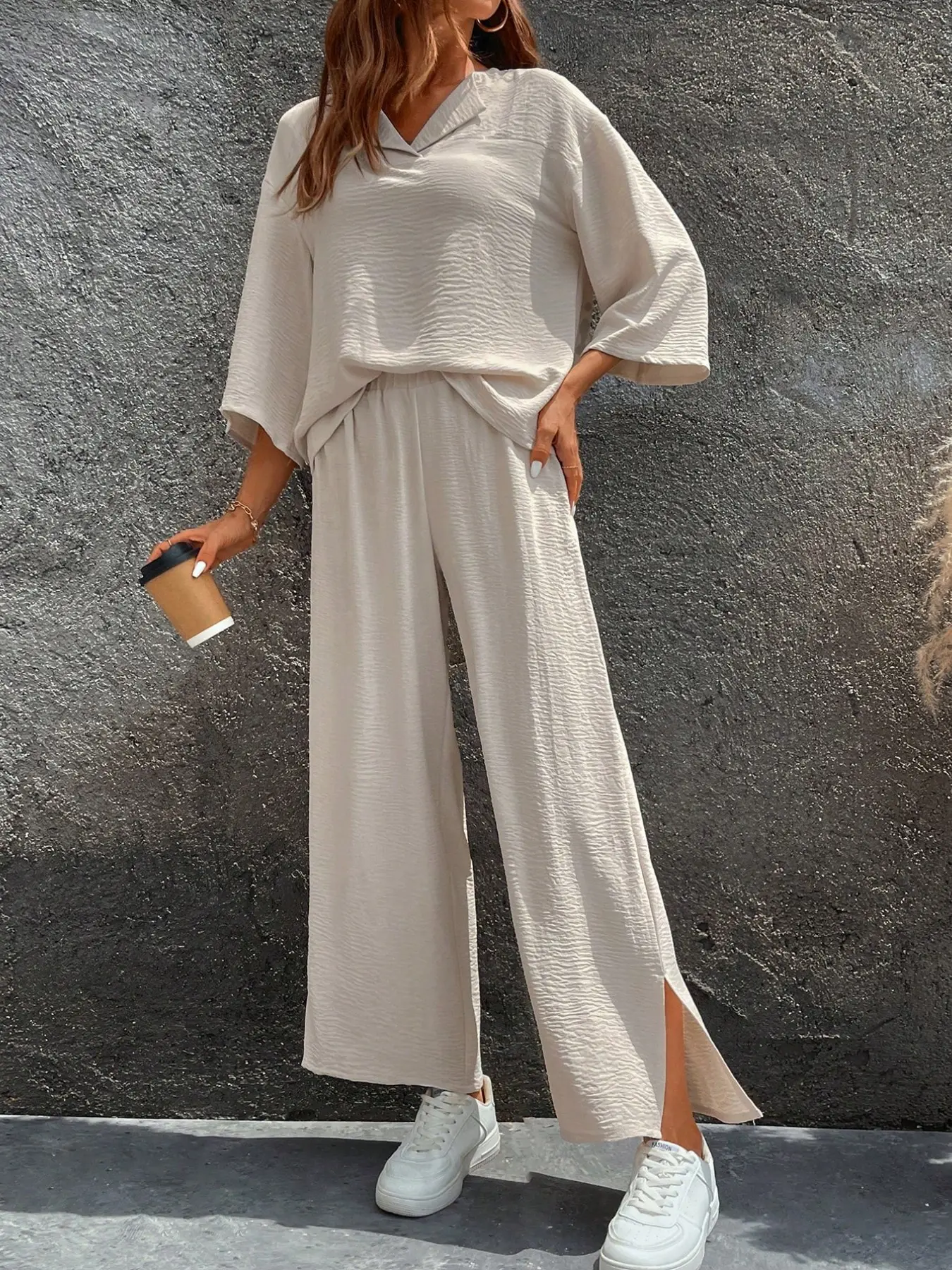 Spicy Coquette Beige Textured Collared Oversized Top & Split Hem Wide Leg Pants Vacation Set Chill Casual Beige Textured Collared Oversized Top & Split Hem Wide Leg Pants Office Two-Piece Set