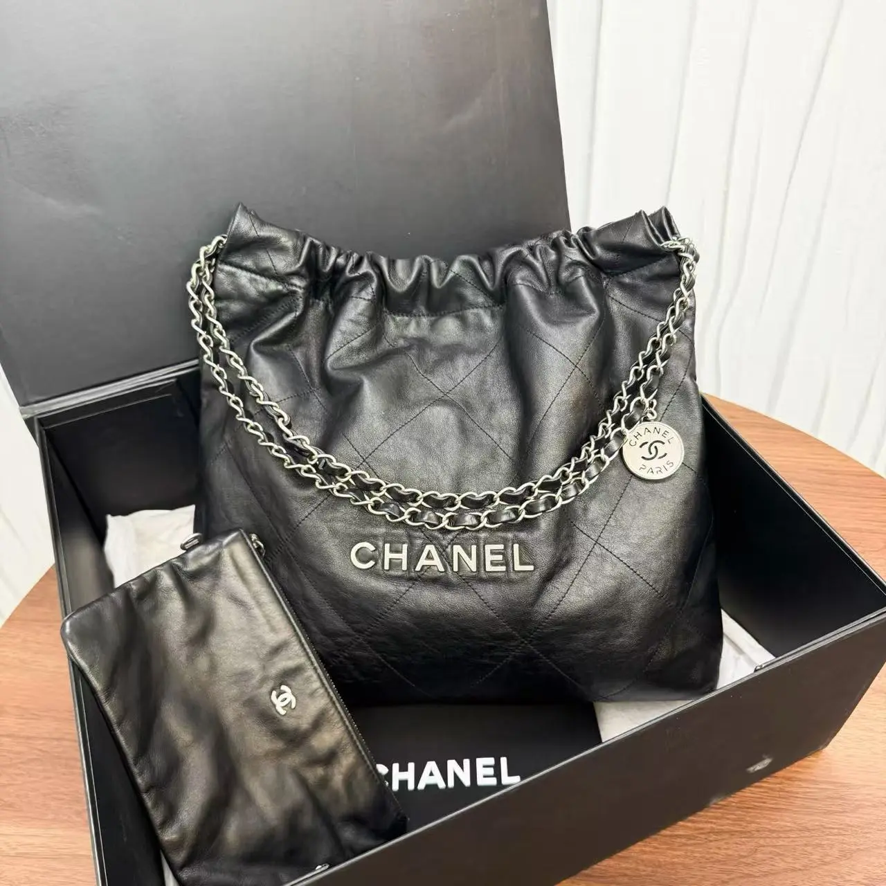 Pre-owned CHANEL 22 bag, shiny calfskin, silver logo 22 tote, drawstring hobo bag, comes with matching pouch, large capacity luxury tote