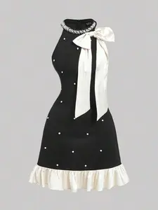 ✨ Elegant Pink Mini Dress With Statement Bow Accent, Ideal For Party And Holiday Nights.