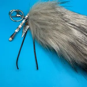 Faux Foxtail Salt and Pepper Arrowhead Keychain with Elegant Beaded Accents and Soft Fur Texture