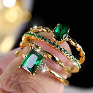 A fashionable 14k gold-plated twisted ring set for women, adorned with blue stones, perfect jewelry for parties.