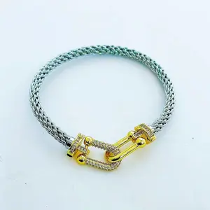 Maite Jewelry Two-Tone and Gold Stainless Steel Bangle Set with Elegant Clasp Design