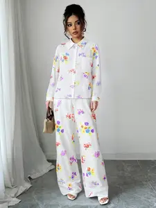 White printed shirt and wide leg pants two-piece set - must-have for vacation | vibrant daisy print | lightweight chiffon fabric | loose fit and flowing silhouette | perfect for spring outings, vacations, and office commuting # printed two-piece set