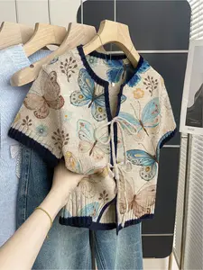 Women's khaki bohemian vacation short-sleeve knit top. Loose round neck, contrast butterfly print, front tie and contrast piping. Comfortable for spring & summer casual wear. Womenswear